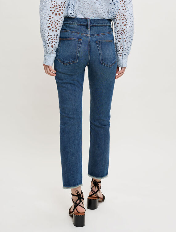 Slim-fit jeans, frayed at the bottom - Trousers & Jeans - MAJE