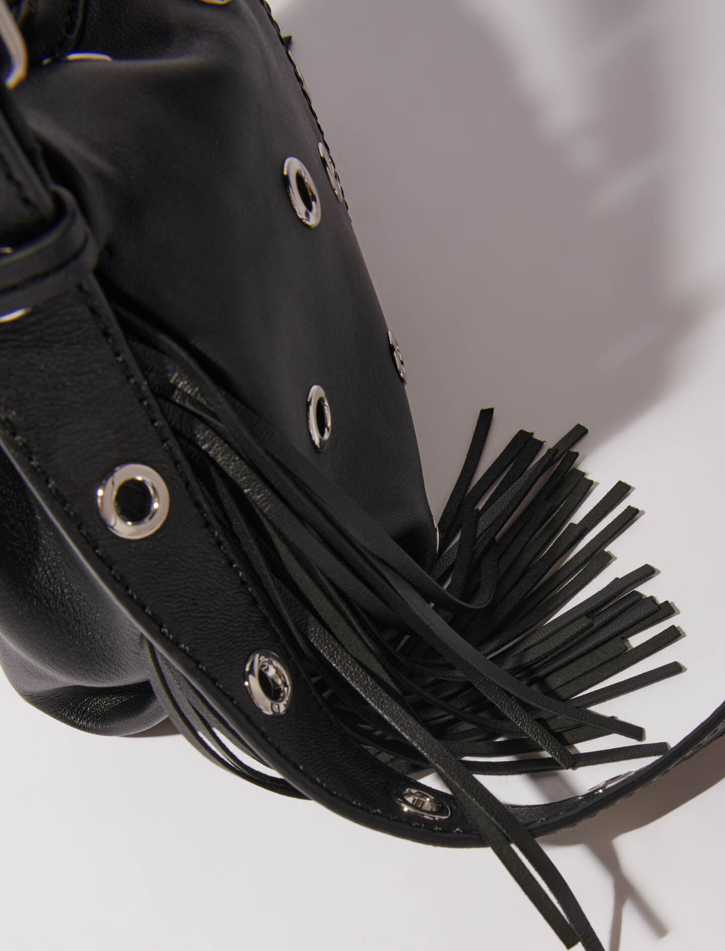 124MISSMMINIOEILLETS Miss M Mini eyelet leather bag - M Bag - Maje.com